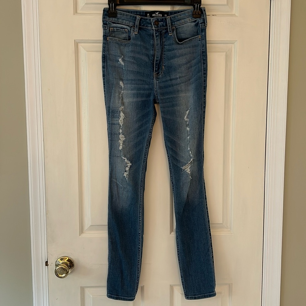 Hollister Ultra High Rise Super Skinny jeans. Distressed, light washed.